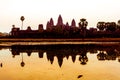 Angkor Wat at sunrise across the lake, reflected in water Royalty Free Stock Photo