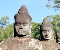 Sculptural stone group of guard soldiers at the gates of the ancient Angkor Wat is a temple complex in Cambodia Royalty Free Stock Photo