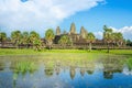 Angkor Wat Temple and palm trees with front lake