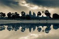 Angkor Wat Temple with reflection on water before sunset Siem Reap Cambodia in split tone.