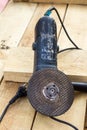 Angle grinder is on the background of construction Royalty Free Stock Photo
