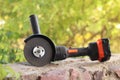 Angle grinder with battery. Power tool close-up Royalty Free Stock Photo