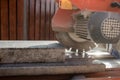 An angle grinder or circular saw with a concrete block Royalty Free Stock Photo