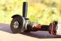 Angle grinder with handle on the veranda Royalty Free Stock Photo