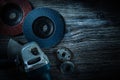 Angle grinder radial sanding discs on vintage wooden board