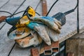 Angle grinder, safety goggles, gloves, a piece of pipe. Worker tools