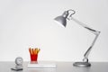 Angle Poise Lamp On Office Desk Royalty Free Stock Photo