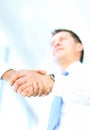 Angle-shot of shake hands Royalty Free Stock Photo