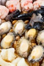 Big bowl feast or poon choi with different seafood vertical composition Royalty Free Stock Photo