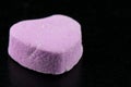 Angle View of Blank Purple Candy Heart on Black Royalty Free Stock Photo