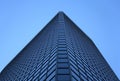 Angle view of a glass-windowed office tower