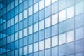 Angle view of modern skyscraper business district in day light. Blue Skyscraper facade, office buildings. Modern glass