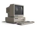 Angle View of an Old Desktop PC with Floppy Drive Keyboard and Mouse Isolated on a White Background.