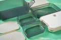 Plastic takeout lunch box with individual containers with the lids opened Royalty Free Stock Photo