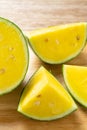 small slices yellow color fresh watermelon at vertical composition