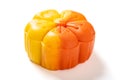 trendy and beautiful flower shape yellow and orange colors moon cake on a white background