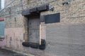 Angle view on a vintage industrial loading dock on back of brick warehouse