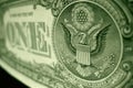 Angled, shallow focus shot of the great seal, on the American one dollar bill. Royalty Free Stock Photo