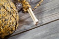 Angled closeup of bottom part of wooden Knitting needles