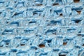 Angled detail view of blue crocheted afghan blanket