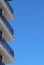 Angled  detail view of Panorama Balconies of a  modern mediterranean resort hotel at the seashore in Torremolinos against blue sky Royalty Free Stock Photo