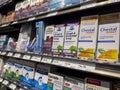 Mill Creek, WA USA - circa May 2022: Angled, selective focus on cold, cough, and flu medicine for sale inside a Town and Country Royalty Free Stock Photo