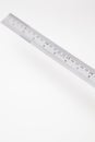 Angled stainless steel ruler with inches