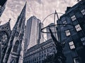 An angled view of the Atlas statue facing Saint Patrick s Cathedral church. Royalty Free Stock Photo
