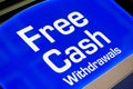 Blue Free Cash Withdrawal sign.