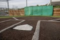 Angled view of a large, empty baseball field on a bright, sunny day Royalty Free Stock Photo