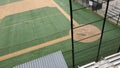 Angled view of a large, empty baseball field on an overcast day Royalty Free Stock Photo