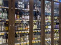 Seattle, WA USA - circa August 2022: Angled view of a locked up liquor cabinet inside a QFC grocery store