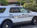 Mill Creek, WA USA - circa May 2022: Angled view of a police vehicle outside of Mill Creek City Hall