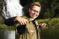 Angler with Brown trout Royalty Free Stock Photo