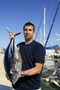 Angler fishing big game Albacore tuna