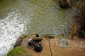 Angler Fishing on Fast Flowing River