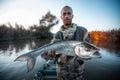 Angler holds big Asp fish Royalty Free Stock Photo