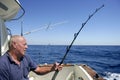 Angler senior big game sport fishing boat Royalty Free Stock Photo