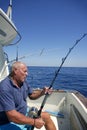 Angler senior big game sport fishing boat Royalty Free Stock Photo