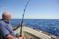 Angler senior big game sport fishing boat Royalty Free Stock Photo