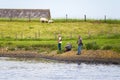 Anglers fishing off of Spui river, Netherlands