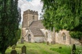 The Anglo-Saxon Church of the Holy Rood in the village of Daglingworth, Cotswolds, Gloucestershire, UK Royalty Free Stock Photo