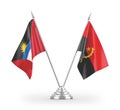 Angola and Antigua and Barbuda table flags isolated on white 3D rendering