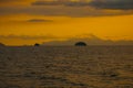 Angra dos Reis, Brazil, Ilha Grande: Beautiful scenery with ships overlooking the sea and mountains at sunset