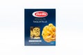 Angri, Italy. September 2th, 2020. Pack of Italian tagliatelle pasta noodles in cardboard package isolated on white background