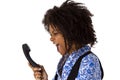 Angry african american woman with handset