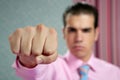 Angry aggresive businessman with fist closeup Royalty Free Stock Photo