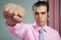 Angry aggresive businessman with fist closeup Royalty Free Stock Photo