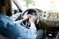 Angry aggressive african driver beep and shouts in the car. Road rage concept Royalty Free Stock Photo