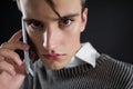 Angry androgynous man talking on mobile phone Royalty Free Stock Photo